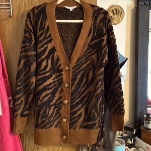Brown and Black cardigan seater.
